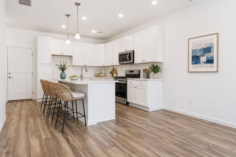 Furnished interior view inside a new home in The Townes at Skyline Ridge, Castle Pines (Image 4).
