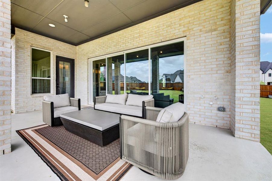 Exterior details and patio area of a home in Light Farms Graham/Reagan, Celina (Image 3).