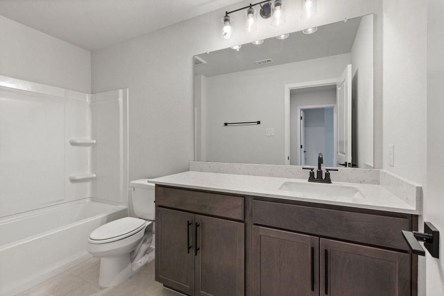 Furnished interior view inside a new home in Lake Park Villas, Wylie (Image 41).