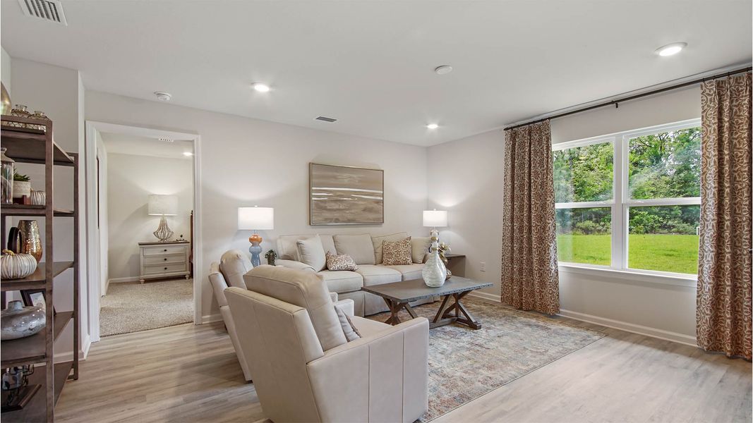 Representative furnished interior of a home built from the Cali by D.R. Horton in Ashton Park Phase III, Freeport (Image 15).