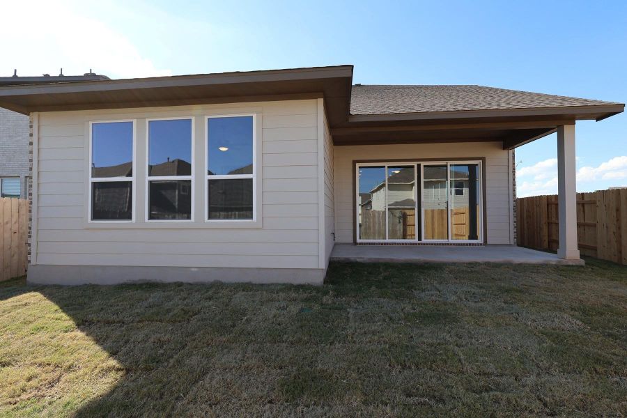 Exterior details and patio area of a home in Lariat, Liberty Hill (Image 3).
