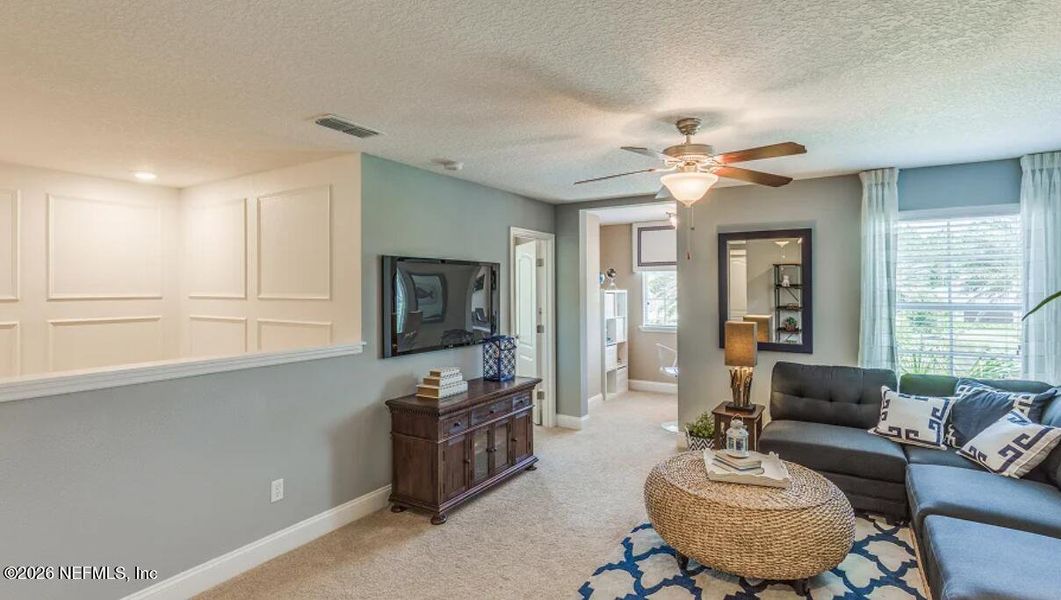 Furnished interior view inside a new home in Silver Falls Single Family at SilverLeaf, St. Augustine (Image 9).