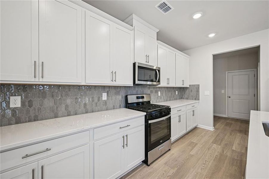 Furnished interior view inside a new home in Parkside at Grayson, Grayson (Image 8). Furnished interior view inside a new home in Parkside at Grayson, Grayson (Image 8).