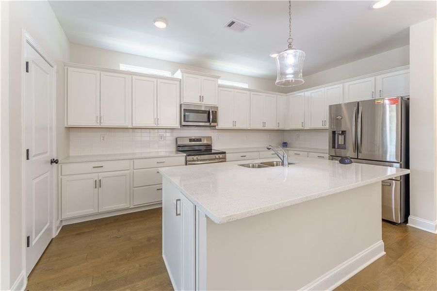 Furnished interior view inside a new home in Edenglen, Buford (Image 5).