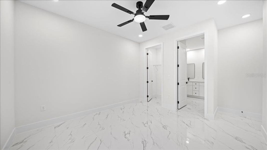 Spacious, unfurnished interior of a new home in , Port Charlotte (Image 23).
