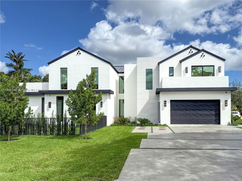 Front exterior of a new home in , South Miami, FL, highlighting curb appeal (Image 1).