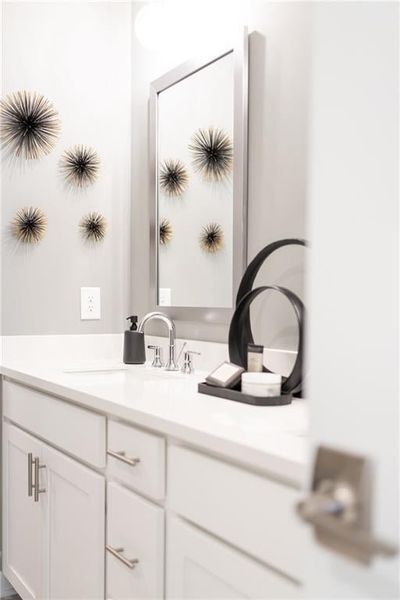 Beautiful designer touches in the primary bathroom. Not actual home. Photos of Model Home.