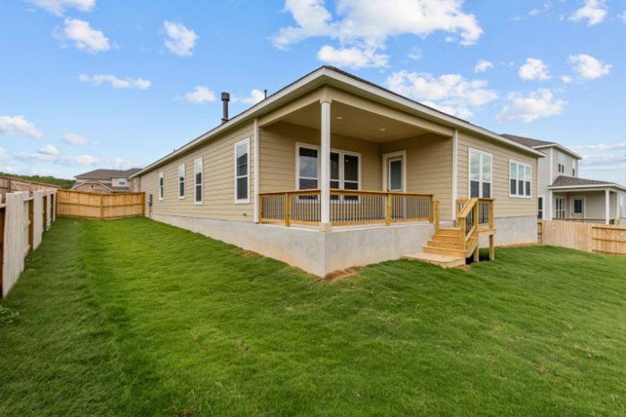 A house with a large front yard.