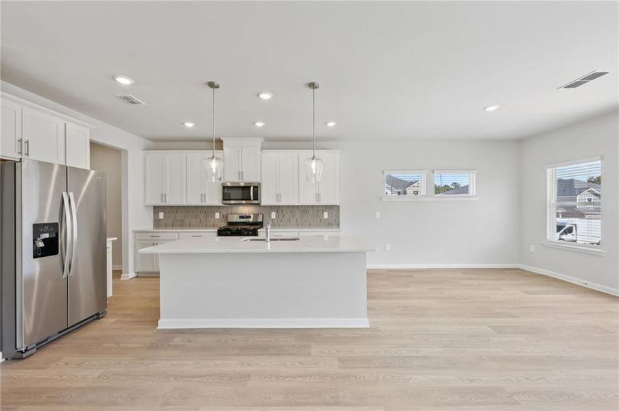 Furnished interior view inside a new home in Parkside at Grayson, Grayson (Image 11).