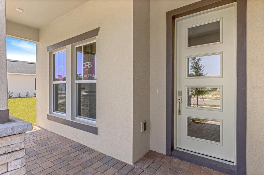 Exterior details and patio area of a home in Gray Hawk at Hole Two, Daytona Beach (Image 28).