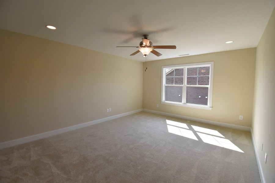Representative unfurnished interior of a home built from the Cosmopolitan by Keystone Homes NC in Weybridge, Burlington (Image 34).