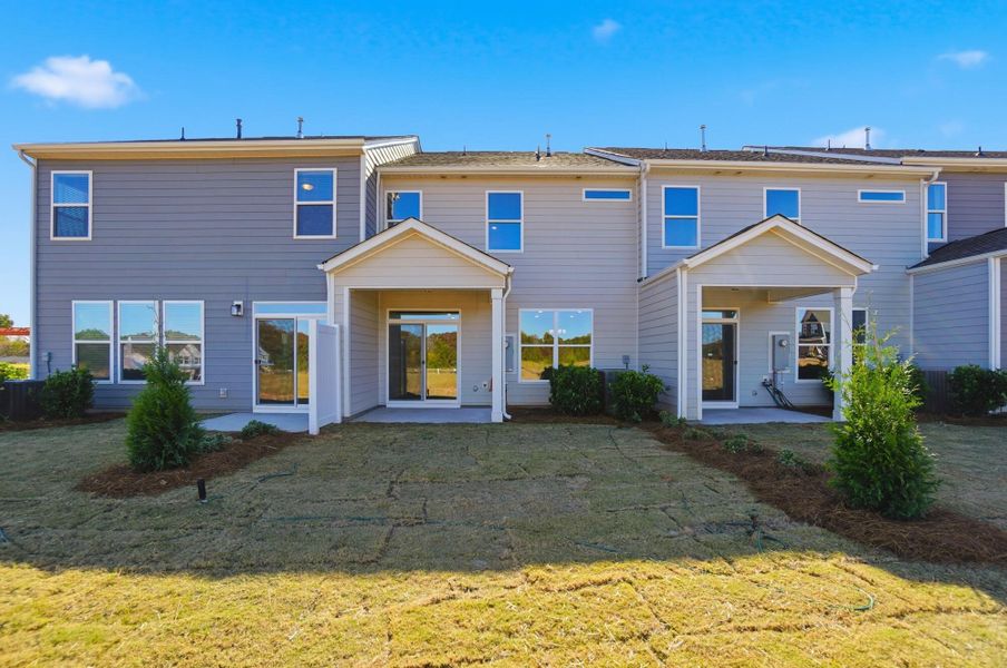 Exterior details and patio area of a home in Blythe Mill Townhomes, Waxhaw (Image 36).