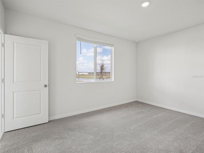 Spacious, unfurnished interior of a new home in Magnolia Bay - Premier Series, Nokomis (Image 9).