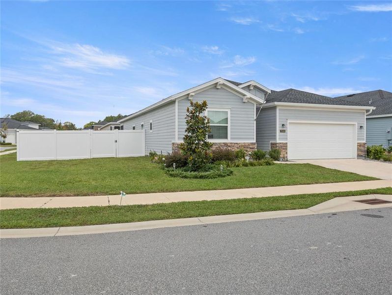 Front exterior of a new home in Liberty Village: Liberty Village - Phase One, Ocala, FL, highlighting curb appeal (Image 19).