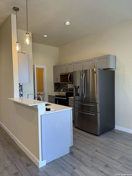 Furnished interior view inside a new home in , San Antonio (Image 8).