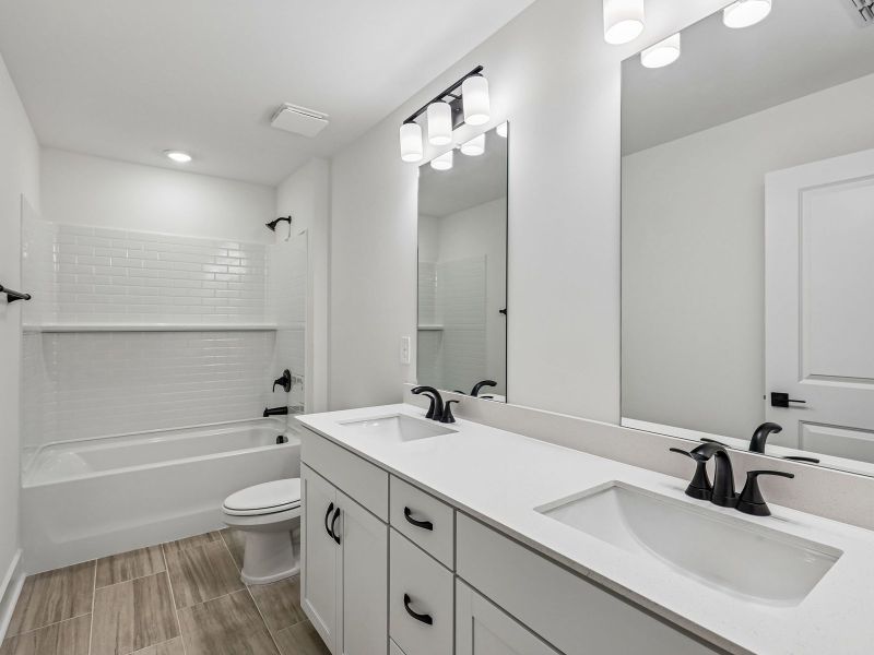 Furnished interior view inside a new home in Station Hill - Estate Series, Franklin (Image 7).