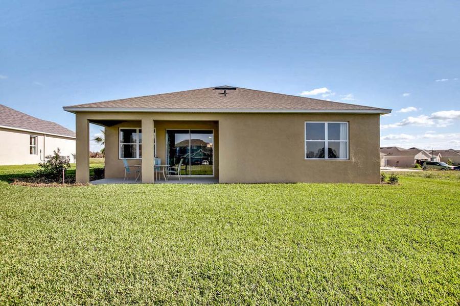 Front exterior of a home in the Preserves at Lakeside Landings community, located in Winter Haven, FL (Image 17).