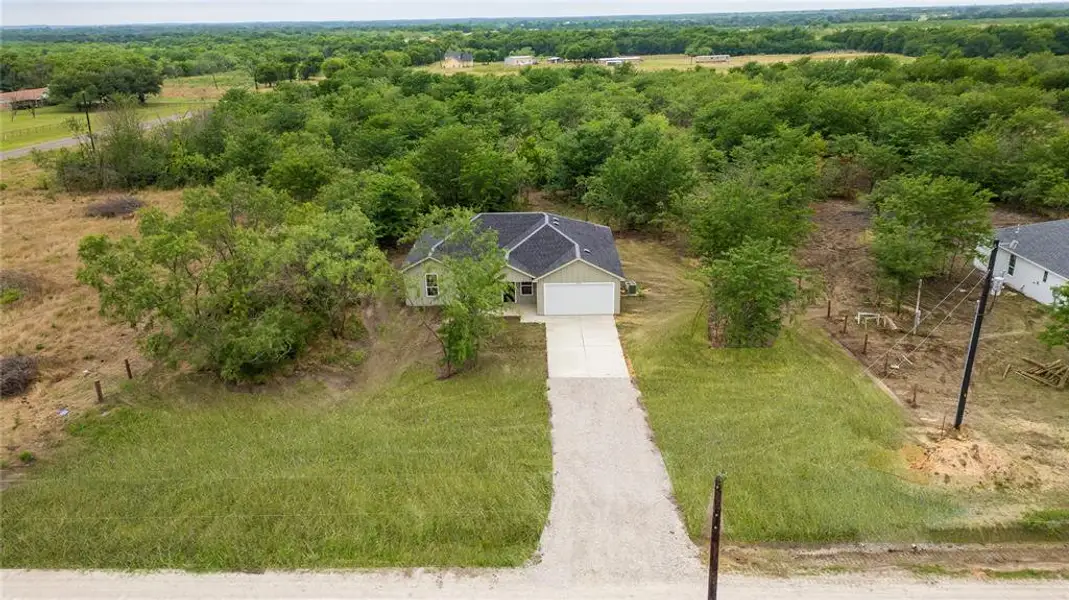 Front exterior of a new home in , Kaufman, TX, highlighting curb appeal (Image 1). Front exterior of a new home in , Kaufman, TX, highlighting curb appeal (Image 1).