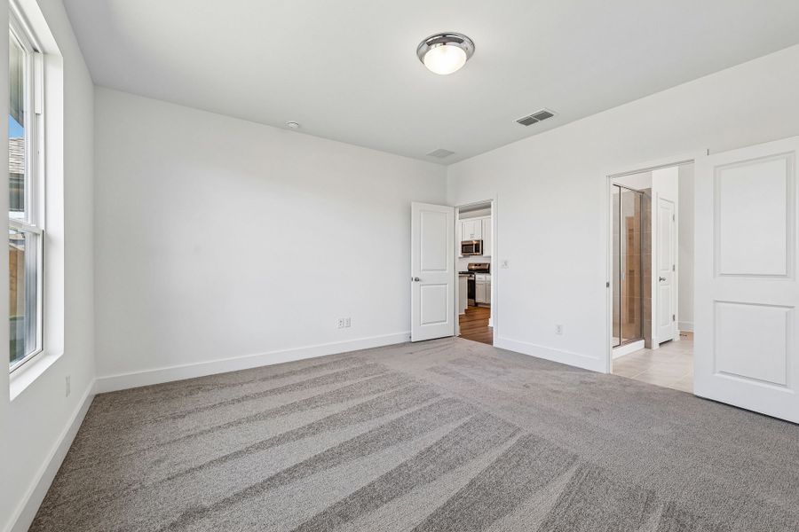 Spacious, unfurnished interior of a new home in Freedom at Anthem, Kyle (Image 20).
