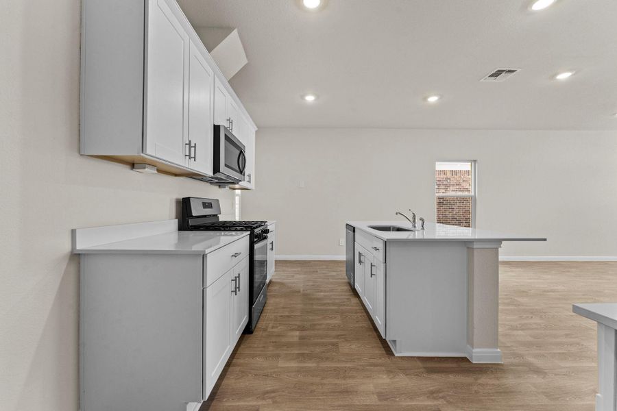 Furnished interior view inside a new home in Whisper South, San Marcos (Image 7).