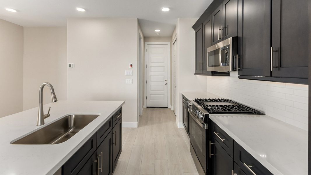 Representative furnished interior of a home built from the The Delaney by DRB Homes in Surprise City Center, Surprise (Image 10).