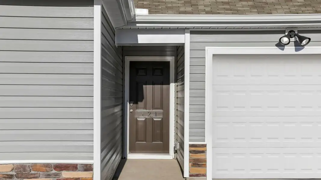Exterior details and patio area of a home in Varner Station, Woodruff (Image 3).