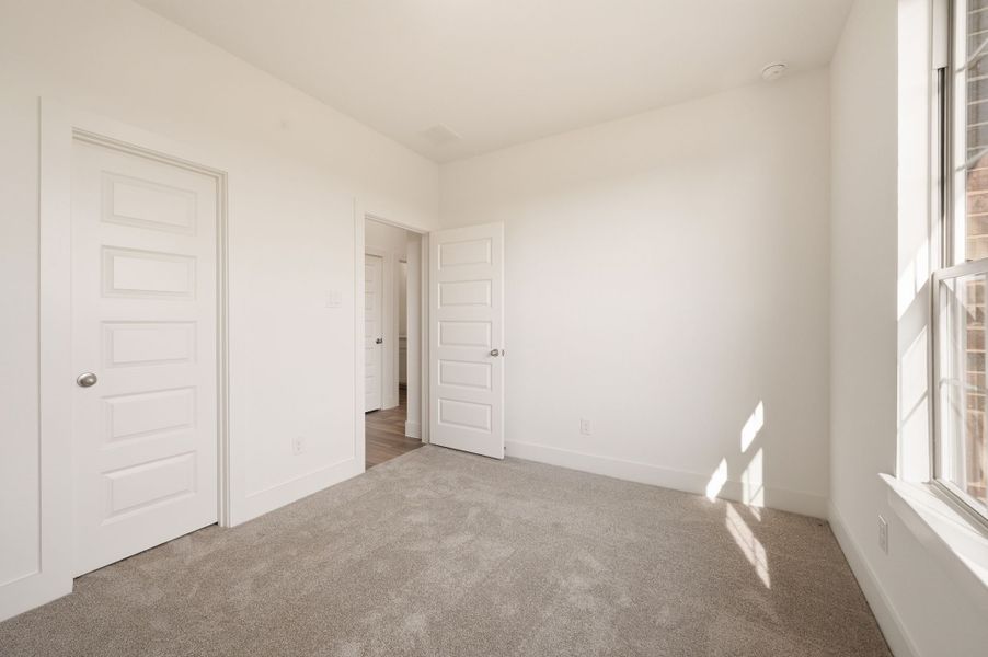 Spacious, unfurnished interior of a new home in Saddleback Estates, Boyd (Image 38).
