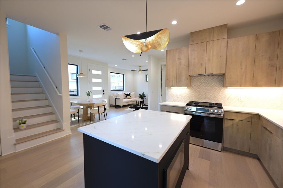 View from kitchen to living room, the open space provides good social environment