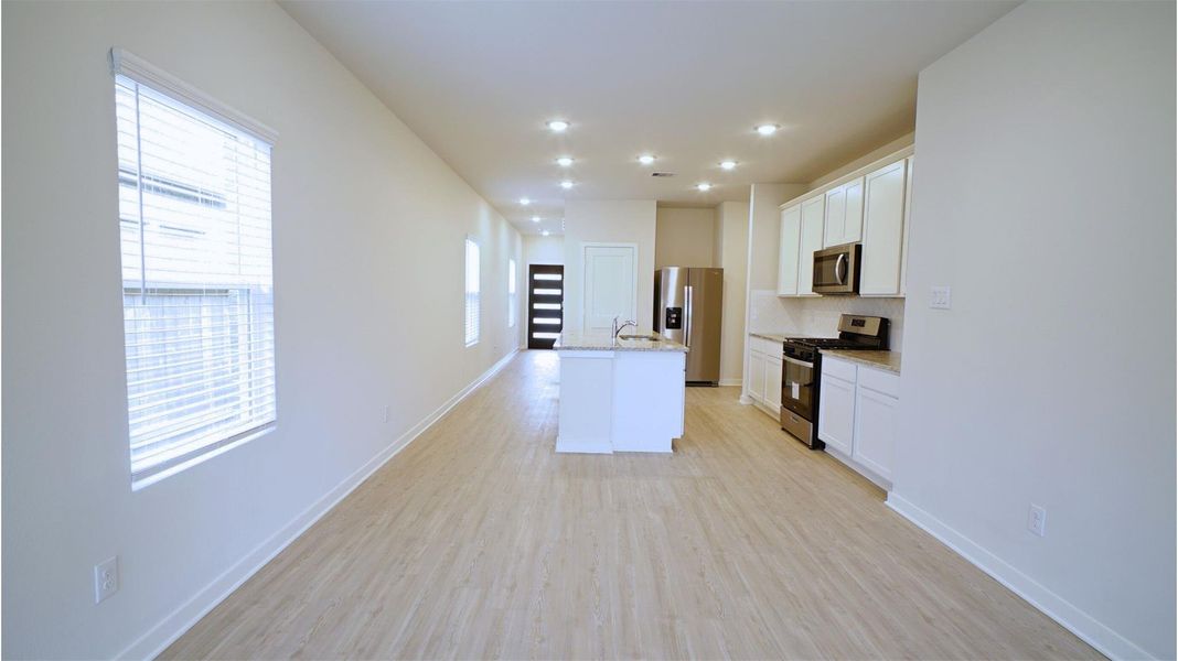 Furnished interior view inside a new home in Lonestar Collection at Aurora, Katy (Image 5).