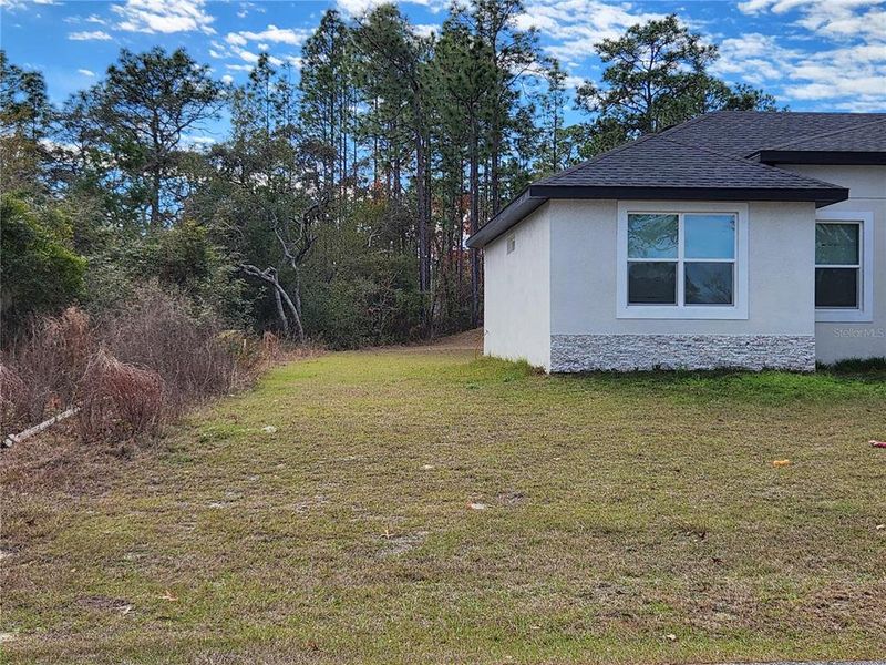 Exterior details and patio area of a home in , Ocala (Image 42).