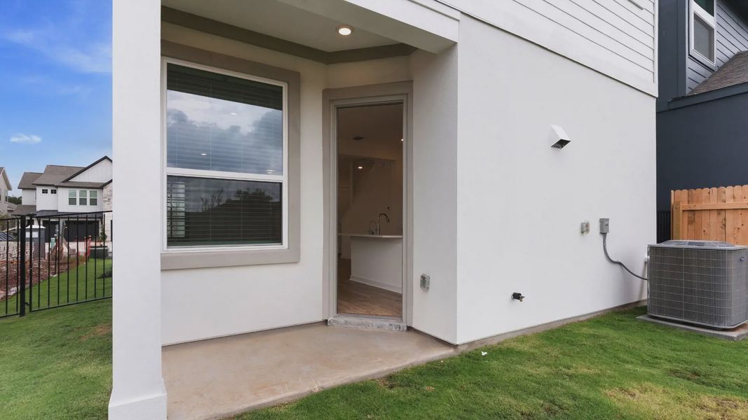 Exterior details and patio area of a home in Santa Rita Ranch, Liberty Hill (Image 3).