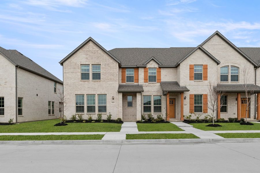 Front exterior of a new home in Sanger Circle – Townhomes, Sanger, TX, highlighting curb appeal (Image 1). Front exterior of a new home in Sanger Circle – Townhomes, Sanger, TX, highlighting curb appeal (Image 1).