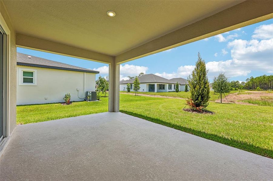 Exterior details and patio area of a home in Ridgehaven - Reserve Series, Ormond Beach (Image 2). Exterior details and patio area of a home in Ridgehaven - Reserve Series, Ormond Beach (Image 2).