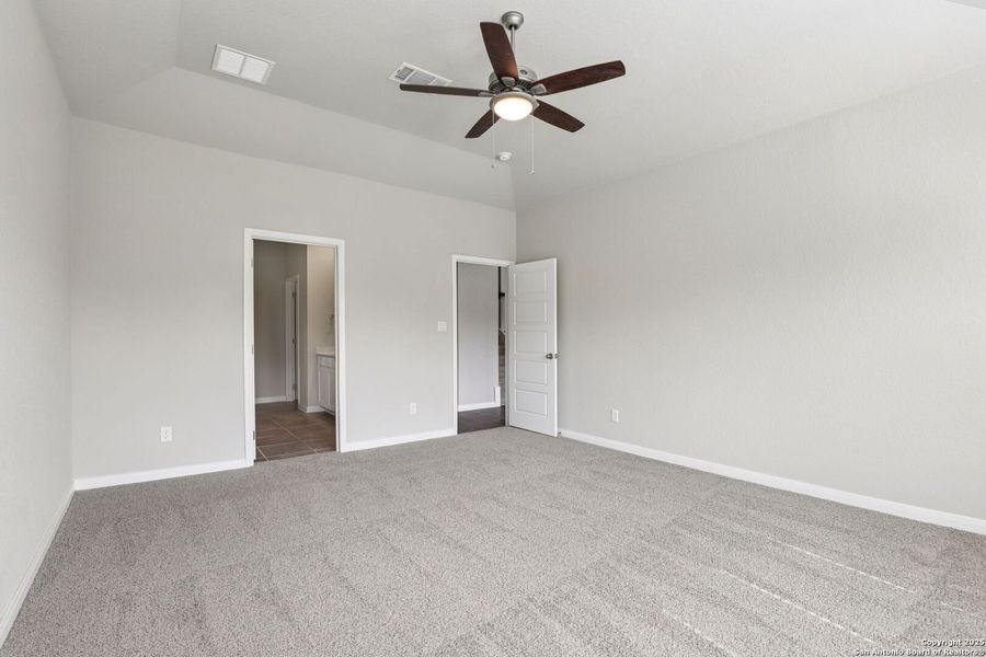 Spacious, unfurnished interior of a new home in Legendary Trails - Classic Series, Cibolo (Image 24). Spacious, unfurnished interior of a new home in Legendary Trails - Classic Series, Cibolo (Image 24).