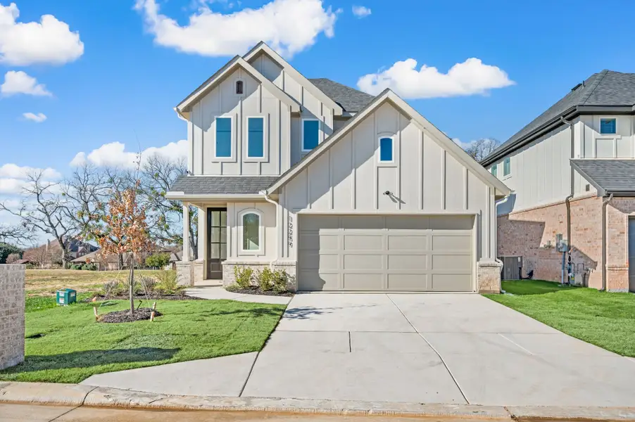 Representative exterior photo of a completed home built from the Ruby by Our Country Homes in The Resort on Eagle Mt. Lake, Saginaw, TX (Image 5).