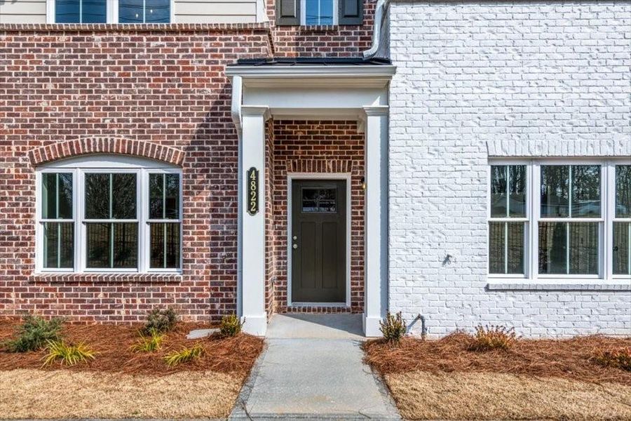 Exterior details and patio area of a home in Wilkins Walk, Mableton (Image 1).