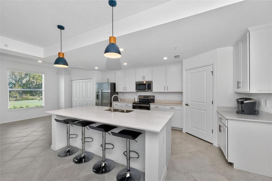 Furnished interior view inside a new home in Wellen Park Golf & Country Club, Venice (Image 44).