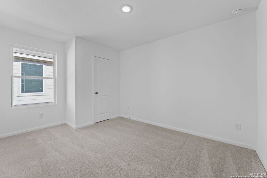 Spacious, unfurnished interior of a new home in Randolph Crossing: Cottage Collection, Converse (Image 12).