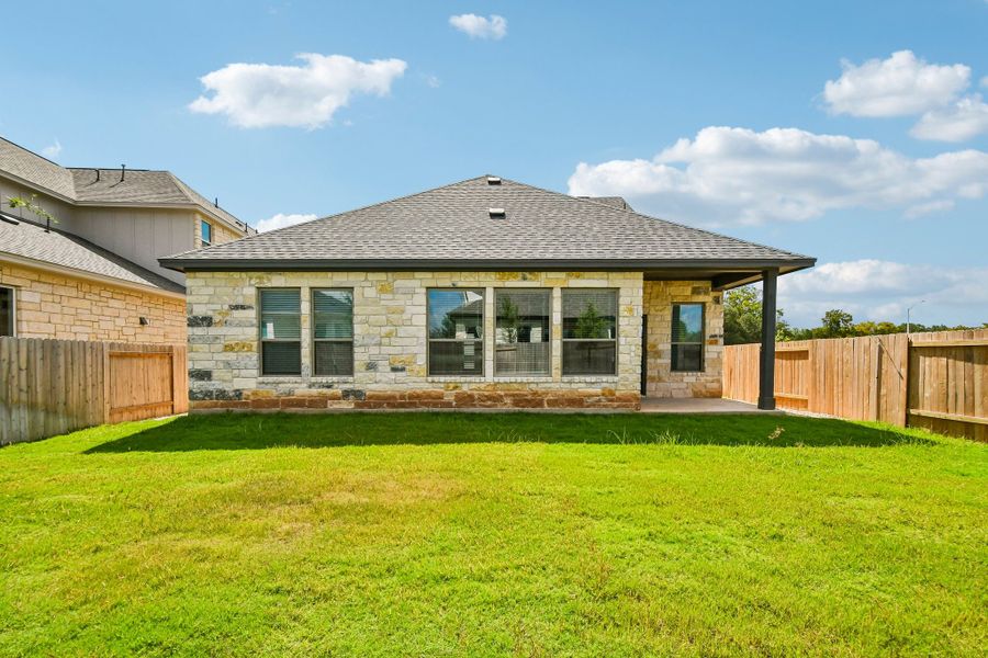 Exterior details and patio area of a home in Persimmon, Buda (Image 16).