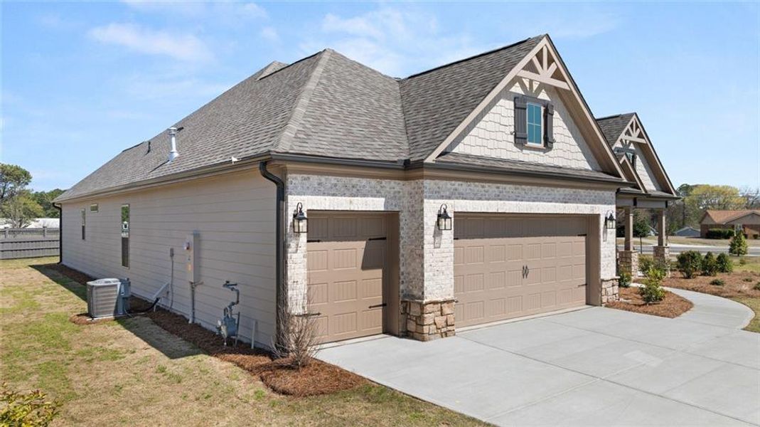 Front exterior of a new home in Soleil Summit Chase, Snellville, GA, highlighting curb appeal (Image 20).