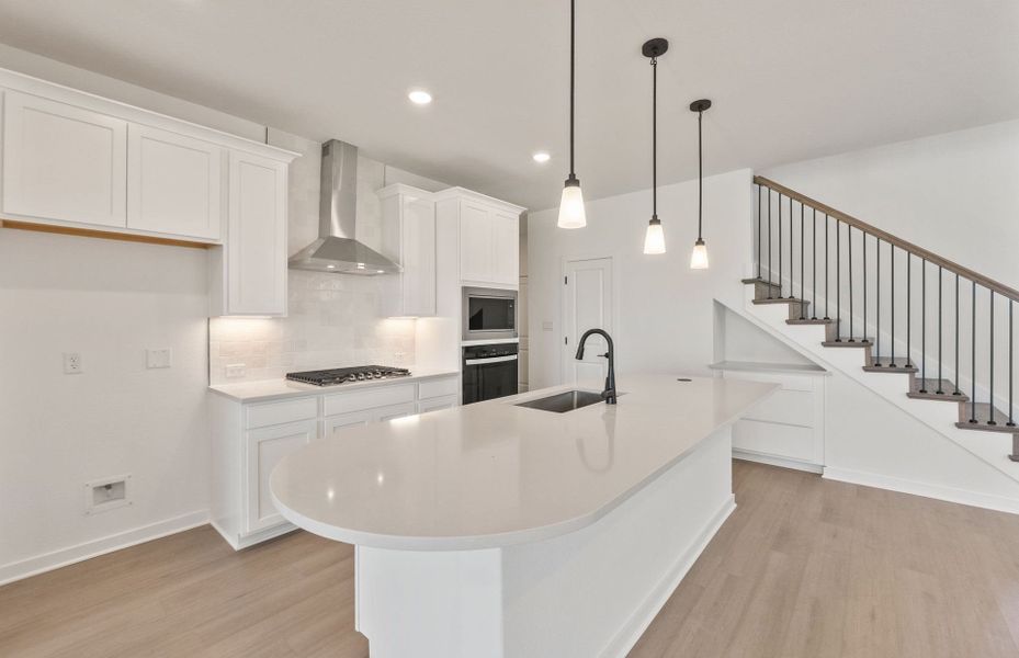 Furnished interior view inside a new home in Wolf Ranch, Georgetown (Image 8).