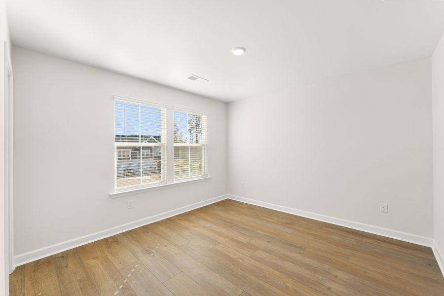 Spacious, unfurnished interior of a new home in Cottages at Lake Emory, Inman (Image 36).