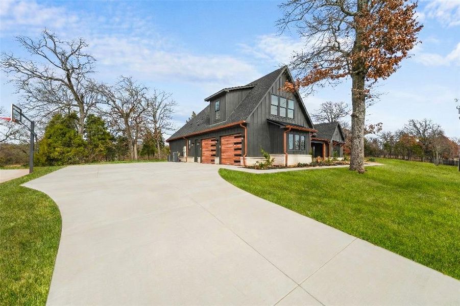 Front exterior of a new home in , Malakoff, TX, highlighting curb appeal (Image 25).