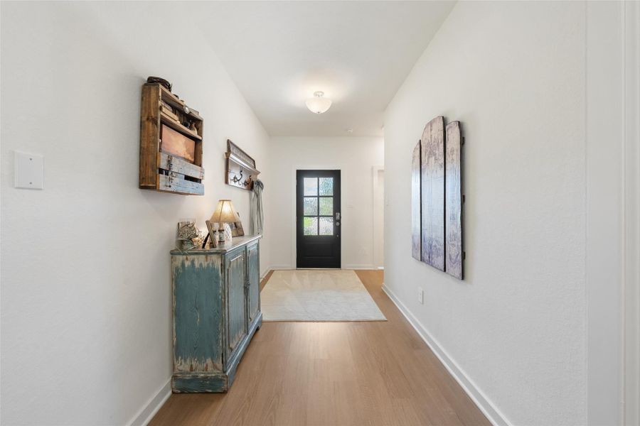 Furnished interior view inside a new home in Pinewood at Grand Texas, New Caney (Image 9).
