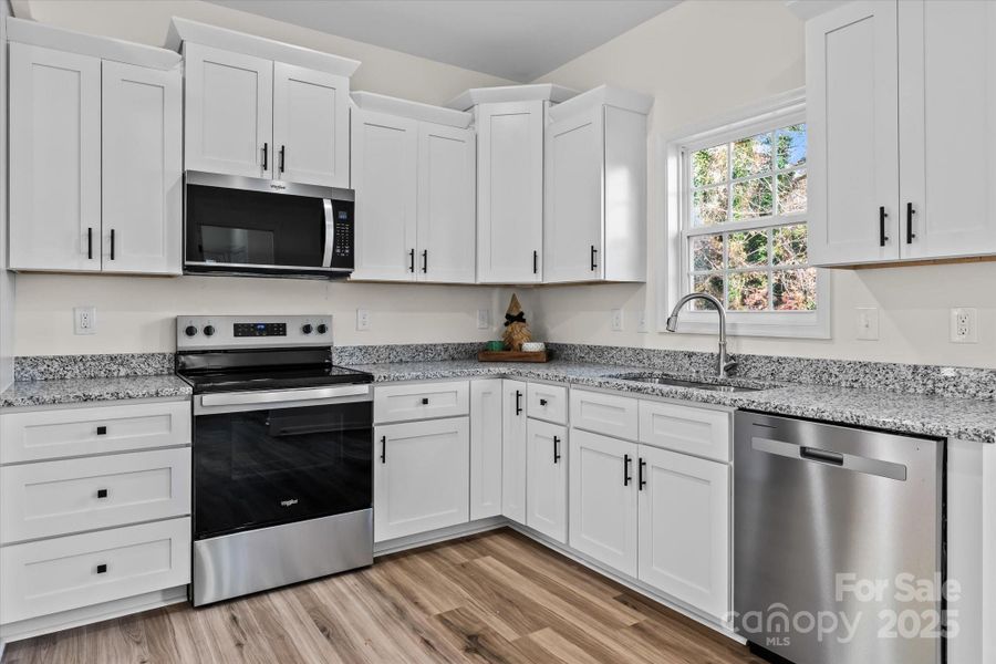 Furnished interior view inside a new home in , High Point (Image 4).