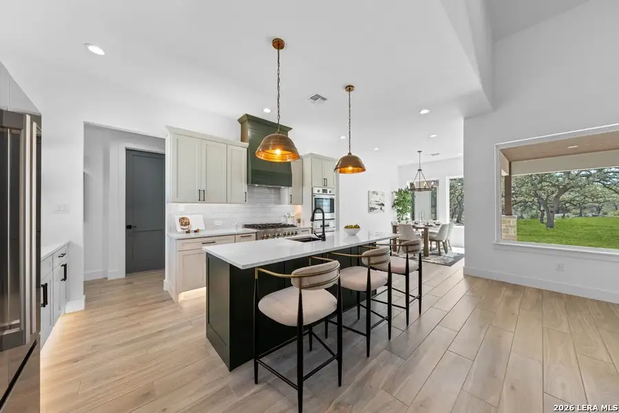 Furnished interior view inside a new home in , Bulverde (Image 11).