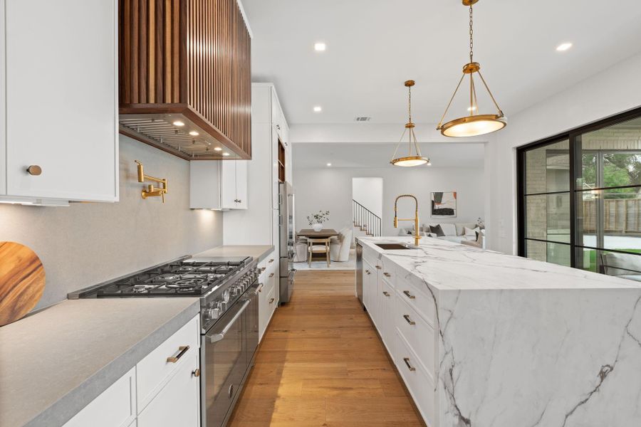 pro appliances/ custom walnut finishes