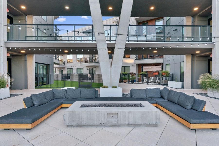 Common area featuring a towering ceiling and recessed lighting