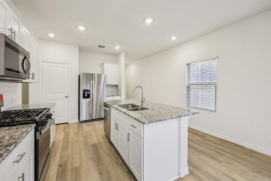 Furnished interior view inside a new home in Parks at Foster Crossing - Spring Series, Anna (Image 9).