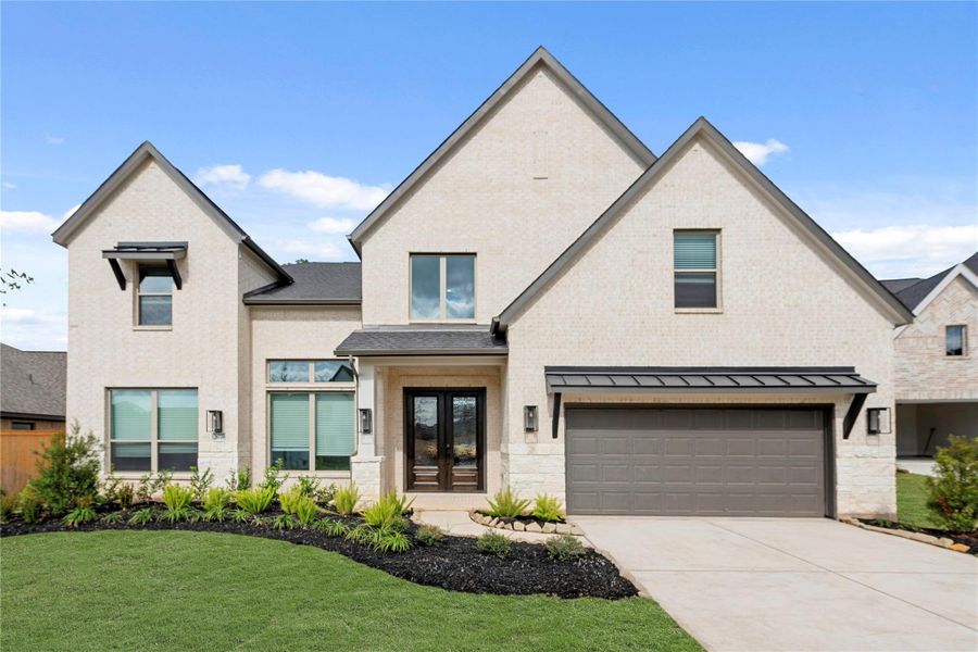 Front exterior of a new home in Kresston - 65', Montgomery, TX, highlighting curb appeal (Image 1). Front exterior of a new home in Kresston - 65', Montgomery, TX, highlighting curb appeal (Image 1).